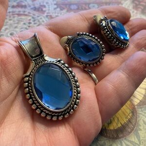 Rare Vintage set of pendant and clip earrings set in blue stone signed BEST